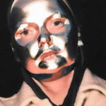 Piers Thibault photo wearing a metal mask