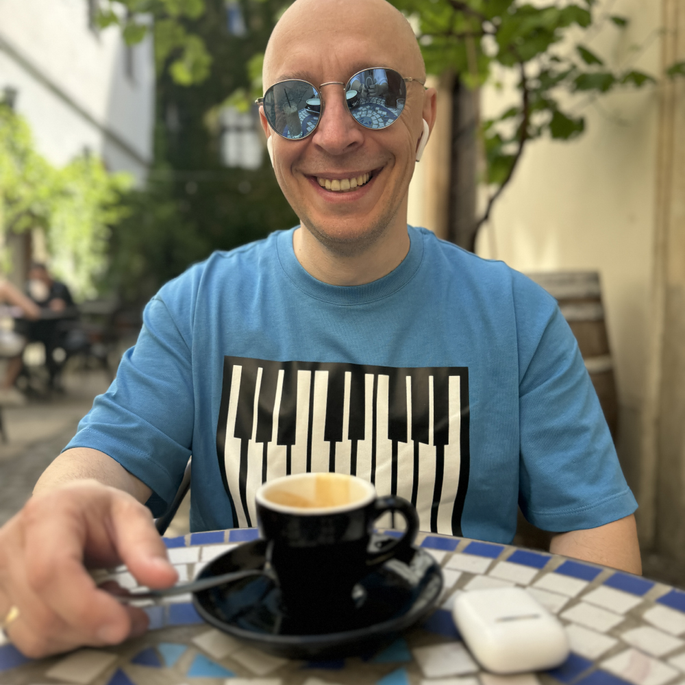 DJ Remo enjoying a coffee at a café