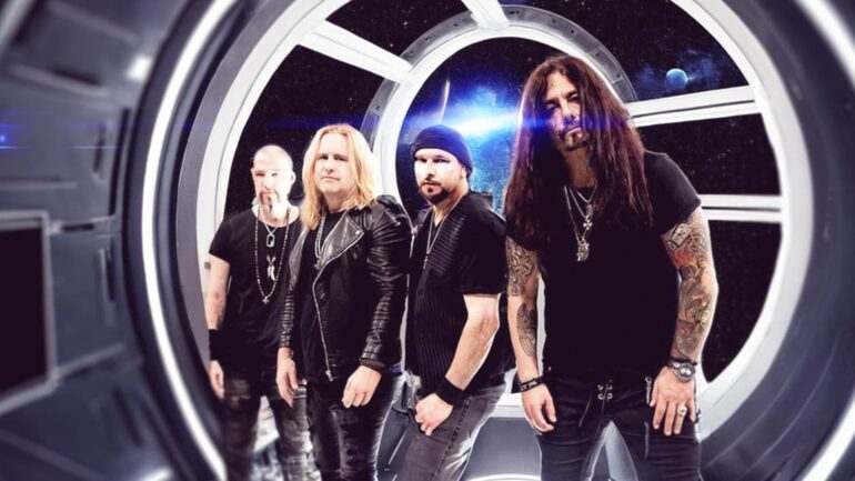 Members of Electric Temple standing together in a futuristic setting. The band includes Andrew Freeman, Mike Duda, Matt Starr, and Tony Childs, all dressed in rock attire, promoting their debut single "Big Black Hole."