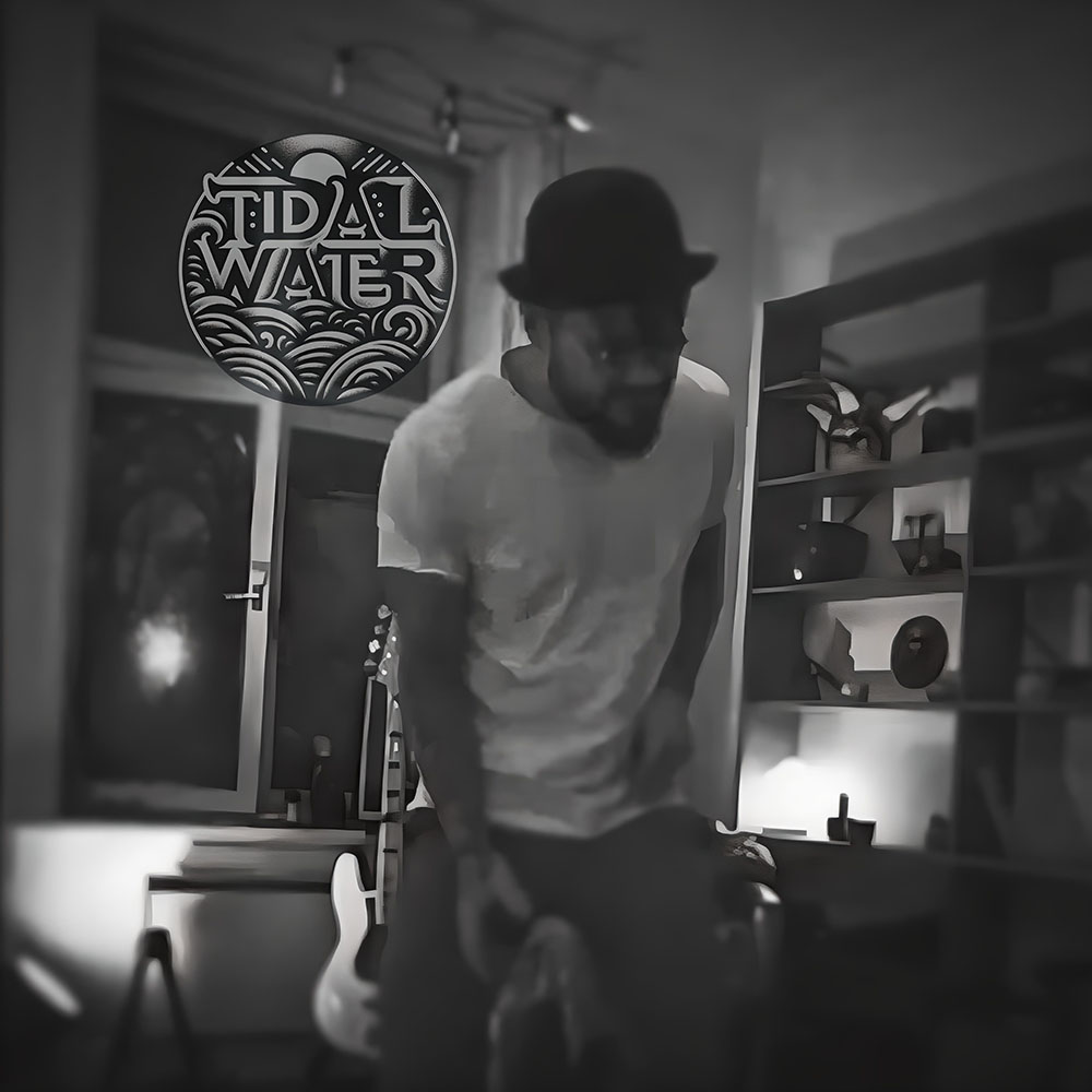 Martin Hovden in a dimly lit room with Tidal Water logo