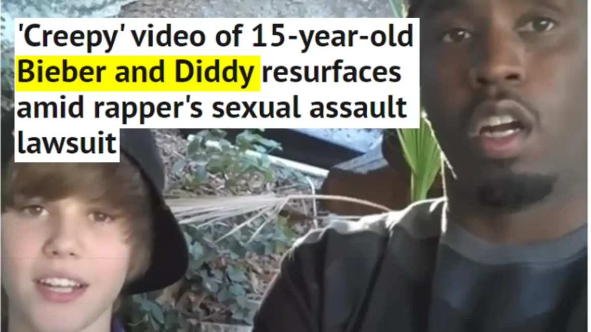 Screenshot of a headline reading, 'Creepy' video of 15-year-old Bieber and Diddy resurfaces amid rapper's sexual assault lawsuit, featuring a young Justin Bieber and Sean 'Diddy' Combs in a low-quality video clip. Bieber looks forward with a neutral expression, while Diddy has a slightly open mouth, adding to the unsettling context of the news.
